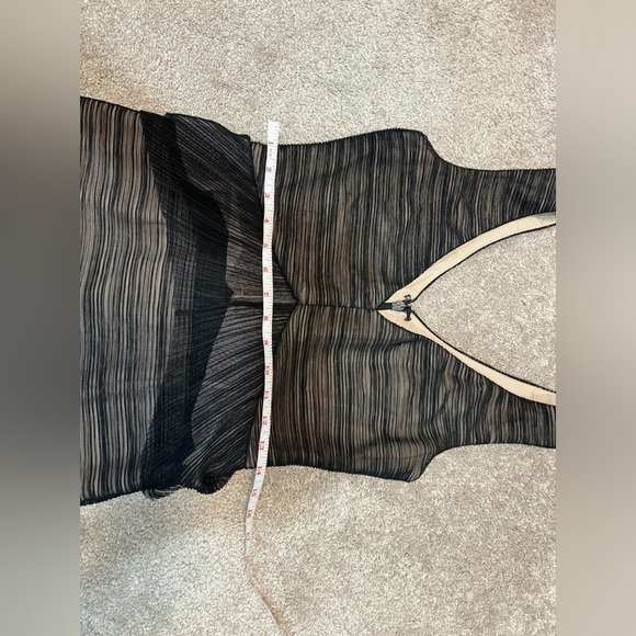 BCBG black dress in size Medium. Place offer I will defently consider Thanks. - Picture 8 of 10